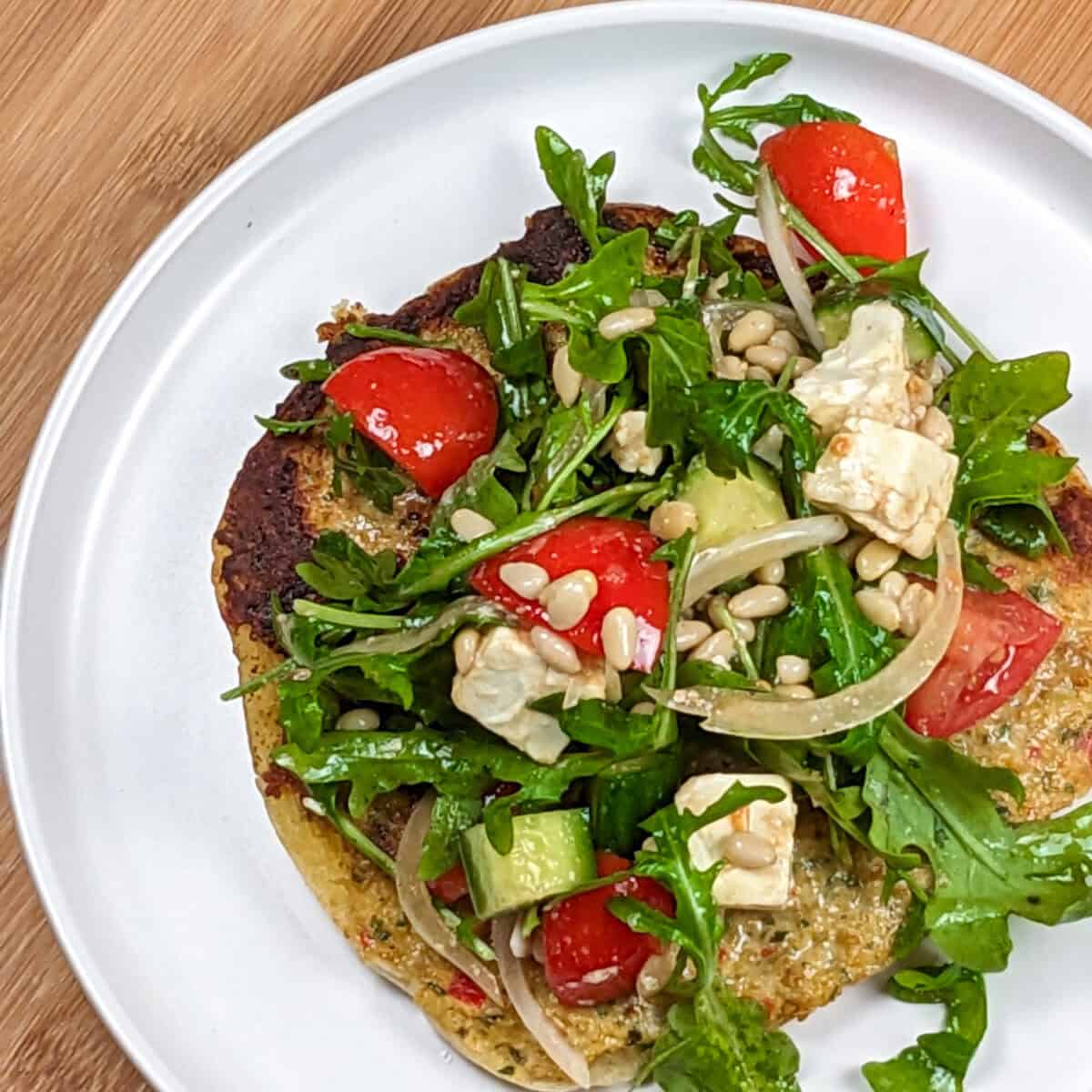 Spicy Chicken Pitas with Arugula Feta Pomegranate Salad - Just Maika Cooking